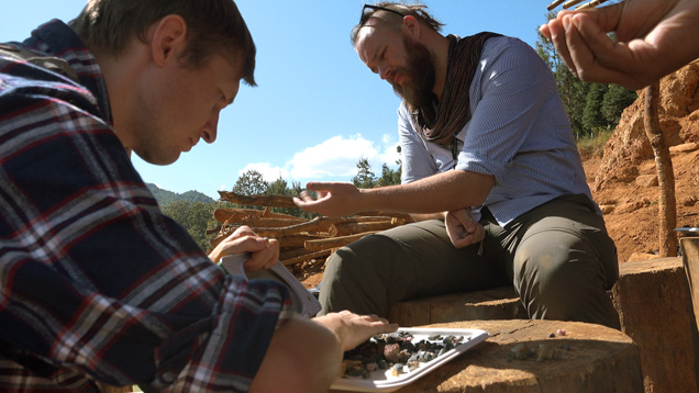 Field gemologists sort through gem gravel in Myanmar Field gemologists sort through gem gravel in Myanmar