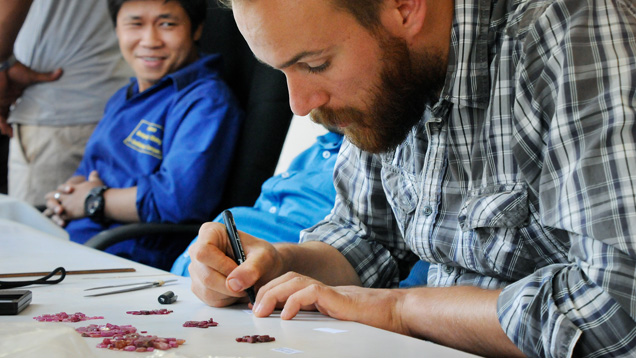 Field gemologist selects rubies in Mozambique Field gemologist selects rubies in Mozambique