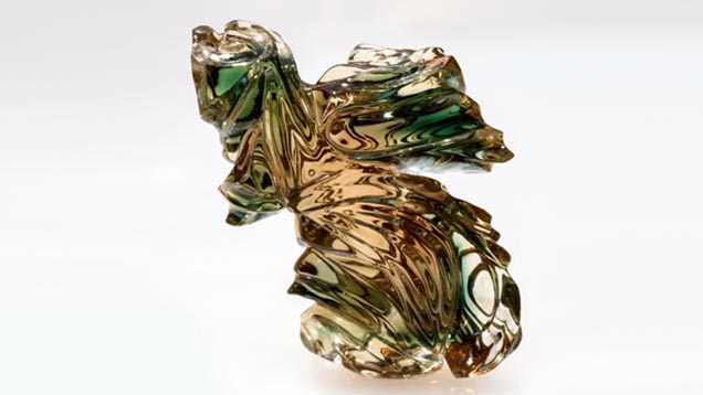 This fabulous fluted carving displays swathes of the teal-green color that Sunstone Butte is justly known for. - Robert Weldon This fabulous fluted carving displays swathes of the teal-green color that Sunstone Butte is justly known for. - Robert Weldon