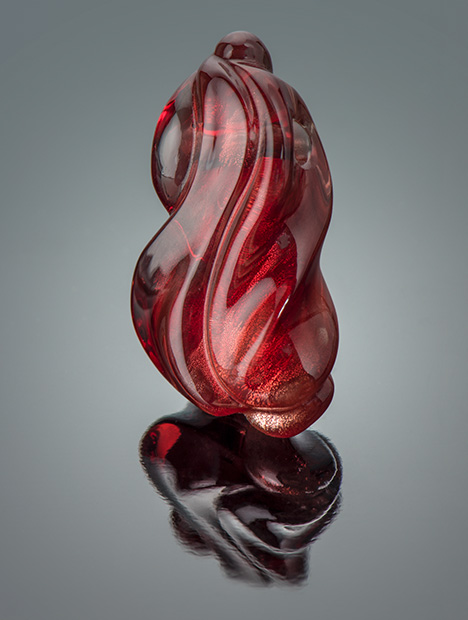 Figure 17. A 31.12 ct Oregon sunstone carving by Larry Woods. Photo by Robert Weldon; courtesy of John D. Woodmark, Desert Sun Mining & Gems. Figure 17. A 31.12 ct Oregon sunstone carving by Larry Woods. Photo by Robert Weldon; courtesy of John D. Woodmark, Desert Sun Mining & Gems.