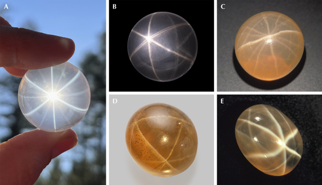 Figure 16. A: A 178 ct 12-rayed star rose quartz sphere in transmitted light; courtesy of Far Arden Essentials. B: An 8.51 ct double polished rose quartz cabochon showing double stars due to reflection from the back surface; courtesy of GIA Museum, collection no. 35214. C: A 31.37 ct star quartz from Sri Lanka shows a complex network of stars with a 12-rayed star in the center; courtesy of Michael Schramm. D: A 44.25 ct star smoky quartz with a network of stars; courtesy of GIA Museum, collection no. 31575. E: A 22 ct multi-star quartz with a strong 6-rayed star in the center. Photos by Lylith Aradia Moon (A), Emily Lane (B and D), Maha Tannous (C), and Andrew Quinlan (E). Figure 16. A: A 178 ct 12-rayed star rose quartz sphere in transmitted light; courtesy of Far Arden Essentials. B: An 8.51 ct double polished rose quartz cabochon showing double stars due to reflection from the back surface; courtesy of GIA Museum, collection no. 35214. C: A 31.37 ct star quartz from Sri Lanka shows a complex network of stars with a 12-rayed star in the center; courtesy of Michael Schramm. D: A 44.25 ct star smoky quartz with a network of stars; courtesy of GIA Museum, collection no. 31575. E: A 22 ct multi-star quartz with a strong 6-rayed star in the center. Photos by Lylith Aradia Moon (A), Emily Lane (B and D), Maha Tannous (C), and Andrew Quinlan (E).