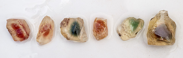 Figure 6. Rough Oregon sunstone from the Sunstone Butte mine showing a wide range of colors. Photo by Robert Weldon. Figure 6. Rough Oregon sunstone from the Sunstone Butte mine showing a wide range of colors. Photo by Robert Weldon.