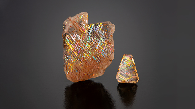Courtesy of Rainbow Lattice, AustraliaThese two gems are rainbow lattice feldspar, weighing 20.74 carats and 2.18 carats. They feature distinctive lattice-like inclusions of magnetite or hematite, often accompanied by iridescent flashes of color known as aventurescence, making them prized for their rare and mesmerizing appearance.